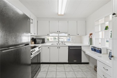 This lovely two bedroom one-and-a-half-bathroom home offers the on Heather Hills Golf Course in Florida - for sale on GolfHomes.com, golf home, golf lot