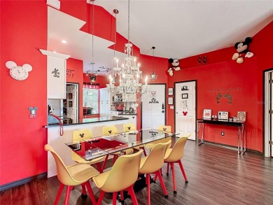 Turnkey 3 Bed, 2 Bath Mickey Mouse-Themed Pool Home in Ridgewood on Ridgewood Lakes Golf and Country Club in Florida - for sale on GolfHomes.com, golf home, golf lot