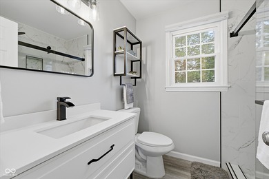 Discover this completely remodeled lakefront gem on Morse on Harbour Trees Golf Club in Indiana - for sale on GolfHomes.com, golf home, golf lot