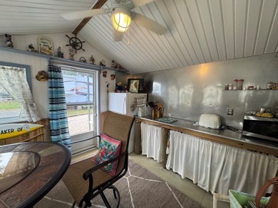 This beautiful property has everything you're looking for in a on Captains Cove Golf and Yacht Club in Virginia - for sale on GolfHomes.com, golf home, golf lot