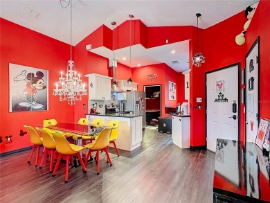 Turnkey 3 Bed, 2 Bath Mickey Mouse-Themed Pool Home in Ridgewood on Ridgewood Lakes Golf and Country Club in Florida - for sale on GolfHomes.com, golf home, golf lot