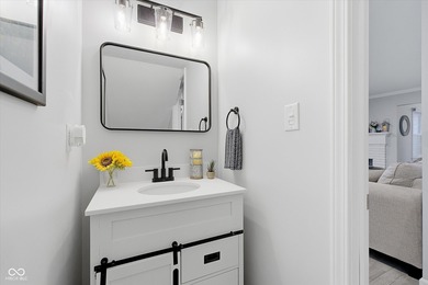 Discover this completely remodeled lakefront gem on Morse on Harbour Trees Golf Club in Indiana - for sale on GolfHomes.com, golf home, golf lot