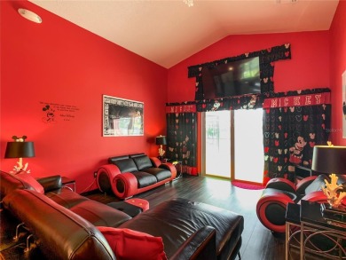 Turnkey 3 Bed, 2 Bath Mickey Mouse-Themed Pool Home in Ridgewood on Ridgewood Lakes Golf and Country Club in Florida - for sale on GolfHomes.com, golf home, golf lot
