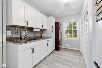 Discover this completely remodeled lakefront gem on Morse on Harbour Trees Golf Club in Indiana - for sale on GolfHomes.com, golf home, golf lot