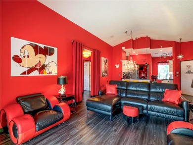 Turnkey 3 Bed, 2 Bath Mickey Mouse-Themed Pool Home in Ridgewood on Ridgewood Lakes Golf and Country Club in Florida - for sale on GolfHomes.com, golf home, golf lot