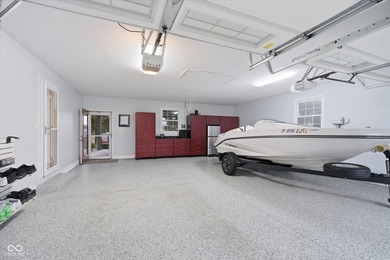 Discover this completely remodeled lakefront gem on Morse on Harbour Trees Golf Club in Indiana - for sale on GolfHomes.com, golf home, golf lot