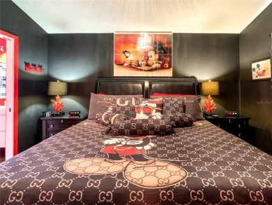 Turnkey 3 Bed, 2 Bath Mickey Mouse-Themed Pool Home in Ridgewood on Ridgewood Lakes Golf and Country Club in Florida - for sale on GolfHomes.com, golf home, golf lot