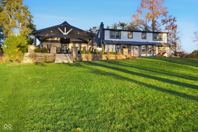 Discover this completely remodeled lakefront gem on Morse on Harbour Trees Golf Club in Indiana - for sale on GolfHomes.com, golf home, golf lot