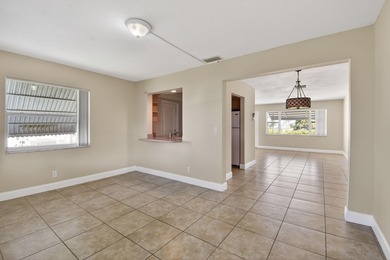 Beautifully maintained single family 2BR/1BA home with flexible on Leisureville Community Golf Course in Florida - for sale on GolfHomes.com, golf home, golf lot