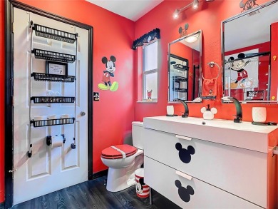 Turnkey 3 Bed, 2 Bath Mickey Mouse-Themed Pool Home in Ridgewood on Ridgewood Lakes Golf and Country Club in Florida - for sale on GolfHomes.com, golf home, golf lot