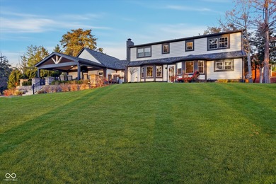 Discover this completely remodeled lakefront gem on Morse on Harbour Trees Golf Club in Indiana - for sale on GolfHomes.com, golf home, golf lot