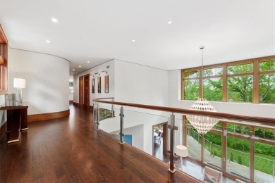 This spectacular Prairie Style home was designed by Rick Jones & on Mission Hills Country Club in Kansas - for sale on GolfHomes.com, golf home, golf lot