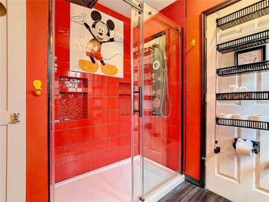 Turnkey 3 Bed, 2 Bath Mickey Mouse-Themed Pool Home in Ridgewood on Ridgewood Lakes Golf and Country Club in Florida - for sale on GolfHomes.com, golf home, golf lot