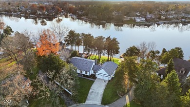 Discover this completely remodeled lakefront gem on Morse on Harbour Trees Golf Club in Indiana - for sale on GolfHomes.com, golf home, golf lot