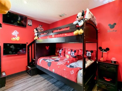 Turnkey 3 Bed, 2 Bath Mickey Mouse-Themed Pool Home in Ridgewood on Ridgewood Lakes Golf and Country Club in Florida - for sale on GolfHomes.com, golf home, golf lot