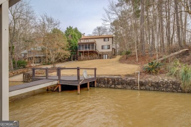 Welcome to this beautifully renovated lakefront home in Turtle on Turtle Cove Golf Course in Georgia - for sale on GolfHomes.com, golf home, golf lot