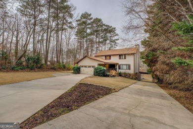 Welcome to this beautifully renovated lakefront home in Turtle on Turtle Cove Golf Course in Georgia - for sale on GolfHomes.com, golf home, golf lot