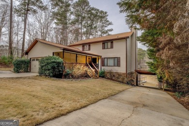 Welcome to this beautifully renovated lakefront home in Turtle on Turtle Cove Golf Course in Georgia - for sale on GolfHomes.com, golf home, golf lot