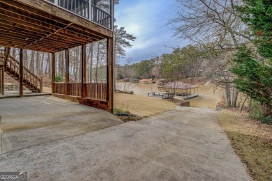 Welcome to this beautifully renovated lakefront home in Turtle on Turtle Cove Golf Course in Georgia - for sale on GolfHomes.com, golf home, golf lot