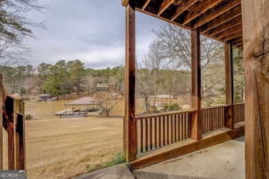 Welcome to this beautifully renovated lakefront home in Turtle on Turtle Cove Golf Course in Georgia - for sale on GolfHomes.com, golf home, golf lot