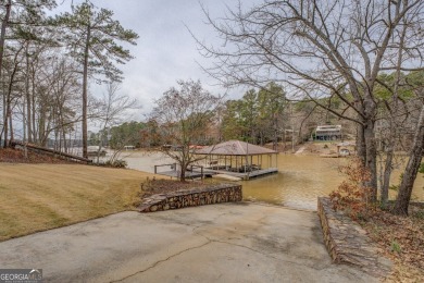 Welcome to this beautifully renovated lakefront home in Turtle on Turtle Cove Golf Course in Georgia - for sale on GolfHomes.com, golf home, golf lot