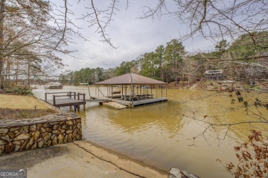 Welcome to this beautifully renovated lakefront home in Turtle on Turtle Cove Golf Course in Georgia - for sale on GolfHomes.com, golf home, golf lot