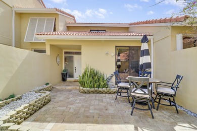 Embrace resort-style living in this inviting 2BR/2BA patio home on PGA National Golf Club in Florida - for sale on GolfHomes.com, golf home, golf lot