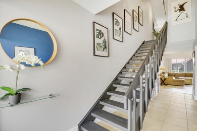 Embrace resort-style living in this inviting 2BR/2BA patio home on PGA National Golf Club in Florida - for sale on GolfHomes.com, golf home, golf lot