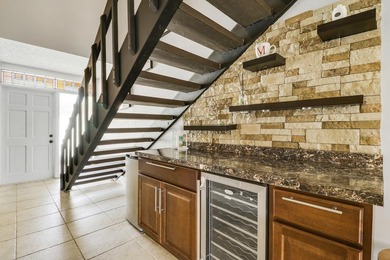 Embrace resort-style living in this inviting 2BR/2BA patio home on PGA National Golf Club in Florida - for sale on GolfHomes.com, golf home, golf lot