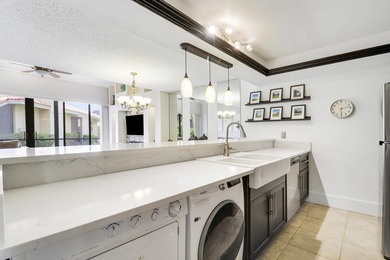 Embrace resort-style living in this inviting 2BR/2BA patio home on PGA National Golf Club in Florida - for sale on GolfHomes.com, golf home, golf lot