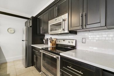 Embrace resort-style living in this inviting 2BR/2BA patio home on PGA National Golf Club in Florida - for sale on GolfHomes.com, golf home, golf lot