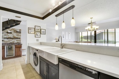 Embrace resort-style living in this inviting 2BR/2BA patio home on PGA National Golf Club in Florida - for sale on GolfHomes.com, golf home, golf lot