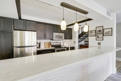 Embrace resort-style living in this inviting 2BR/2BA patio home on PGA National Golf Club in Florida - for sale on GolfHomes.com, golf home, golf lot