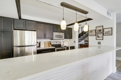 Embrace resort-style living in this inviting 2BR/2BA patio home on PGA National Golf Club in Florida - for sale on GolfHomes.com, golf home, golf lot