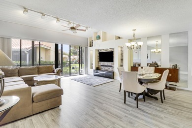 Embrace resort-style living in this inviting 2BR/2BA patio home on PGA National Golf Club in Florida - for sale on GolfHomes.com, golf home, golf lot