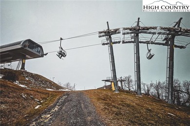 A ~5,000' elevation property at the top of Sugar Mountain in the on Sugar Mountain Golf Course in North Carolina - for sale on GolfHomes.com, golf home, golf lot