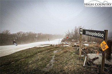 A ~5,000' elevation property at the top of Sugar Mountain in the on Sugar Mountain Golf Course in North Carolina - for sale on GolfHomes.com, golf home, golf lot