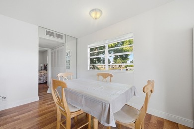 Beautiful corner unit with serene canal views in the highly on Kings Point Golf -Flanders Way in Florida - for sale on GolfHomes.com, golf home, golf lot