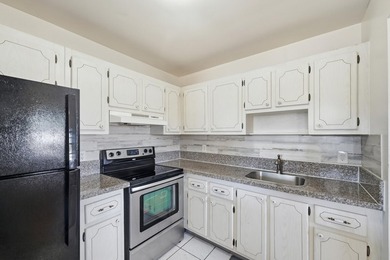 Beautiful corner unit with serene canal views in the highly on Kings Point Golf -Flanders Way in Florida - for sale on GolfHomes.com, golf home, golf lot