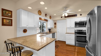 Enjoy easy living in this beautifully updated duplex home in the on PalmBrook Country Club in Arizona - for sale on GolfHomes.com, golf home, golf lot