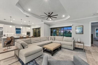 EXQUISITELY DESIGNED POOL HOME IN THE PREMIERE GOLF COMMUNITY OF on Esplanade Golf and Country at Lakewood Ranch in Florida - for sale on GolfHomes.com, golf home, golf lot