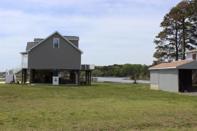 3/1621 Cleared, corner level lot that offers views of the on Captains Cove Golf and Yacht Club in Virginia - for sale on GolfHomes.com, golf home, golf lot