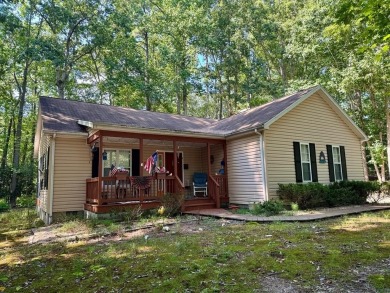 This cozy 2 bedroom 2 bath home located in a quiet section of on Captains Cove Golf and Yacht Club in Virginia - for sale on GolfHomes.com, golf home, golf lot
