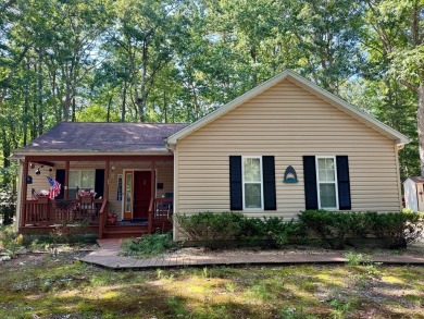 This cozy 2 bedroom 2 bath home located in a quiet section of on Captains Cove Golf and Yacht Club in Virginia - for sale on GolfHomes.com, golf home, golf lot