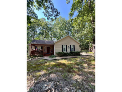 This cozy 2 bedroom 2 bath home located in a quiet section of on Captains Cove Golf and Yacht Club in Virginia - for sale on GolfHomes.com, golf home, golf lot