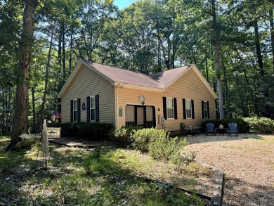 This cozy 2 bedroom 2 bath home located in a quiet section of on Captains Cove Golf and Yacht Club in Virginia - for sale on GolfHomes.com, golf home, golf lot