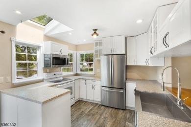 Lakeside living at its finest! Enjoy easy, one-level living in on Lake Lackawanna Golf Course in New Jersey - for sale on GolfHomes.com, golf home, golf lot
