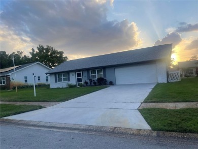 What a GEM of a house....Great Curb Appeal.....  Just a Hop on Highland Lakes Executive Golf Course in Florida - for sale on GolfHomes.com, golf home, golf lot