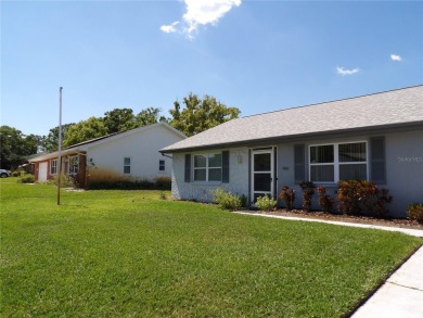 What a GEM of a house....Great Curb Appeal.....  Just a Hop on Highland Lakes Executive Golf Course in Florida - for sale on GolfHomes.com, golf home, golf lot