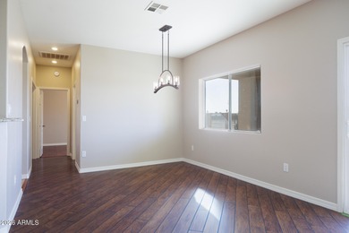 Stunning 3-bedroom home with a 3-car garage perfectly positioned on Arizona City Golf Club in Arizona - for sale on GolfHomes.com, golf home, golf lot